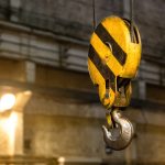 Close up hook crane of overhead crane in factory old machine part concept